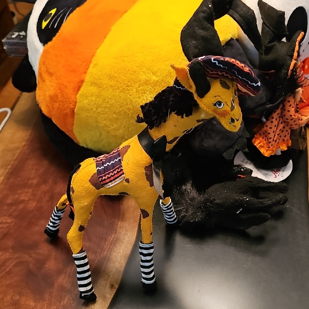 2018 Annalee 12-inch Giraffe Witch doll, a Halloween-themed collectible. 